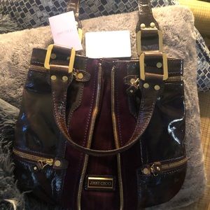 Jimmy Choo Mona handbag in purple.